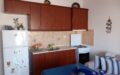 Апартамент в центъра с гараж за продажба в Паралия Офринио, Кавала